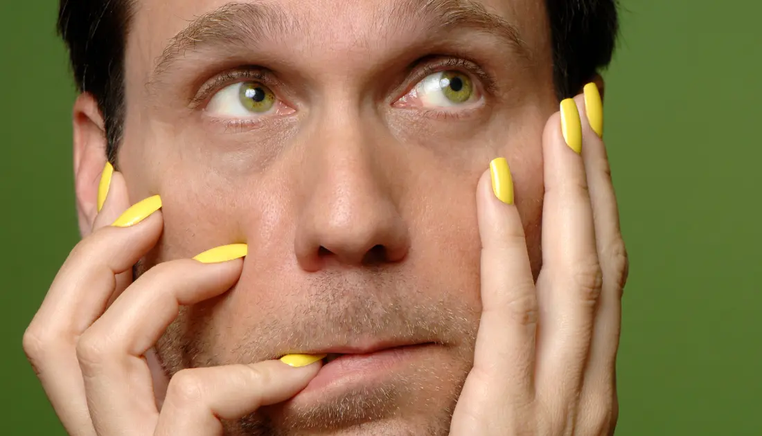 man with yellow nails
